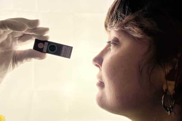 A tiny breadcrumb entombed thousands of years ago alongside an ancient Egyptian’s mummified remains, which was discovered in Leeds, pictured with Lizzie Gothorp, of Leeds Museums and Galleries.