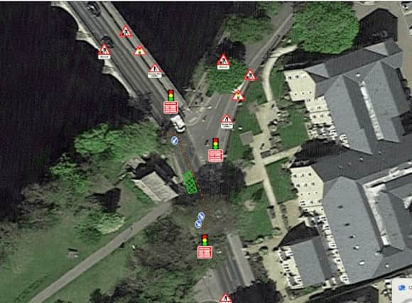 Three-way lights and a temporary pedestrian crossing have been installed at Bridge Street.