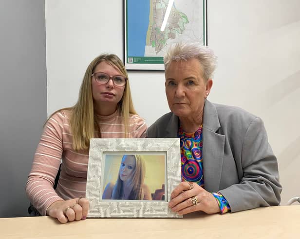 Katie Brett and Lorraine Beavers with a photo of Sasha Marsden.