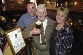 Enjoy these photo memories of pubs we have loved and lost in Pudsey and Stanningley. Pictured is Tommy Spurr standing in the same place as he had done for the last 72 years in October 2003 at the now-closed White Cross with landlord Colm and Sue O'Neill.