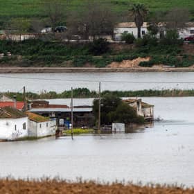 Houses in the middle of a flooded area after Storm Laurence passed through El Palmar de Troya in southern Spain, before Martinho swept in.