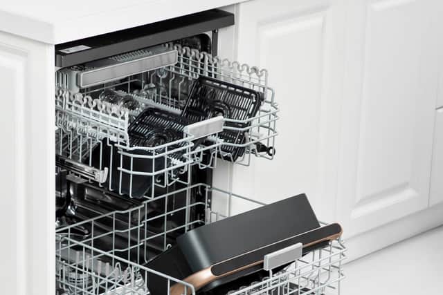 The drawer is very cumbersome when it's out, but thankfully it's dishwasher safe