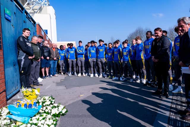 MOVING MEMORIAL: As Leeds United's squad and staff remember Christopher Loftus and Kevin Speight.