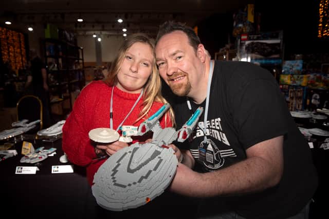Dean Tomlinson with his daughter Ella, 11, sharing an impressive Star Trek themed LEGO collection