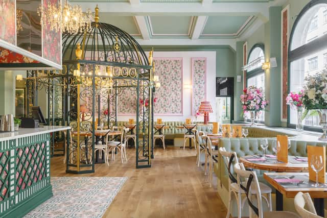 The new restaurant boasts bold and vibrant decor.