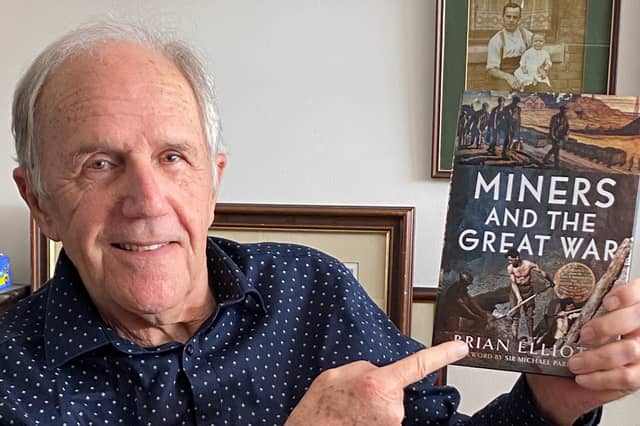 Brian Elliott with his book Miners And The Great War