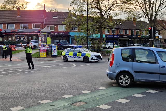 Police pictured at the scene of the incident in Otley Road, Headingley, Leeds.