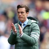 DRAMATIC DENIAL: For Burnley and boss Scott Parker, above, as Leeds United claimed the Championship title.