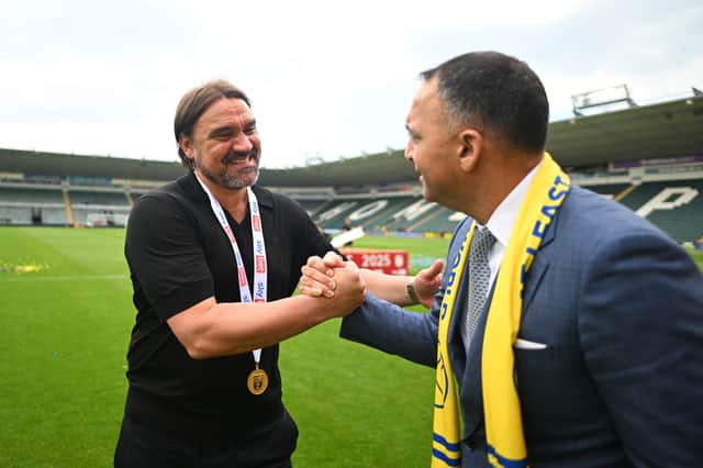 WINNING EMBRACE: Between Daniel Farke and Paraag Marathe.