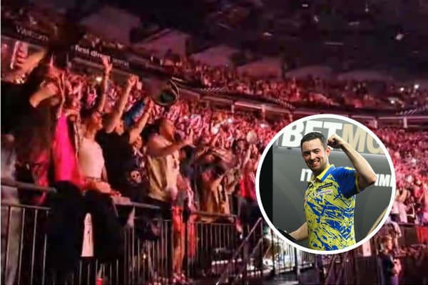 The crowd goes wild as Leeds United fan Luke Humphries seals victory at the First Direct Arena