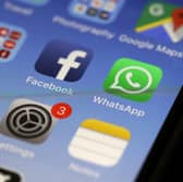 WhatsApp app on an older iPhone model