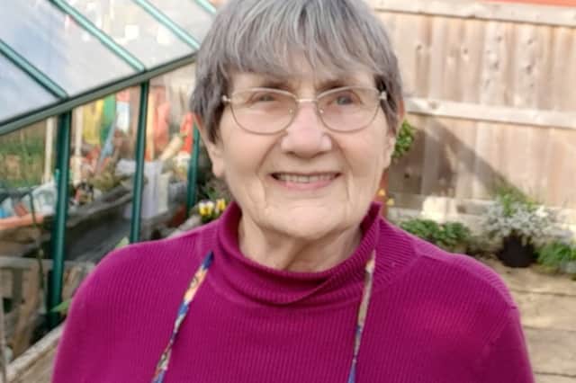 Mavis Robinson MBE in her garden
