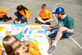 Sacred Heart welcomed Leeds-based artist Andy McVeigh, famously known as Burley Banksy, as part of a vibrant initiative to celebrate the school’s “rich cultural diversity.”