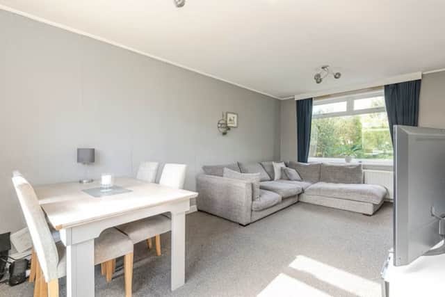 The interior is spacious and well set up for family living
