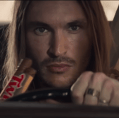 A television advert for Twix biscuits has been banned by the ASA for promoting "dangerous" and "irresponsible" driving