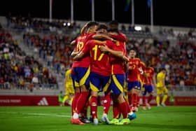 UNITY: Hailed by Leeds United striker Mateo Joseph, left, after a Spain under-21s rollercoaster ride.