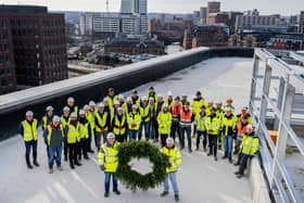 Its completion was marked with a topping off ceremony.