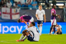 DEFEAT: For England's under-21s as Jarell Quansah looks on, meaning a meeting with a Leeds United man in the Euros quarter-finals.