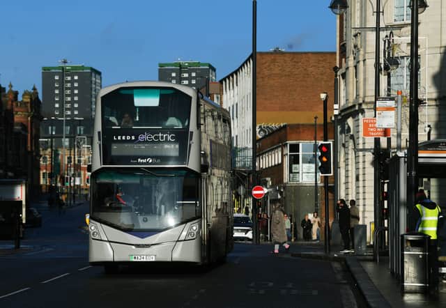 A bus travelling on Vicar Lane in Leeds City Centre.