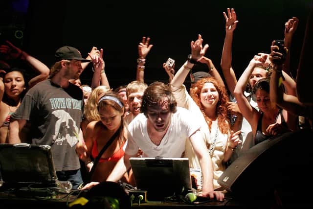 DJ Gregg Gillis of Girl Talk performs on stage during Bonnaroo 2009 on June 12, 2009 in Manchester, Tennessee.