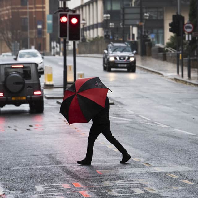 Man braves a storm in Leeds