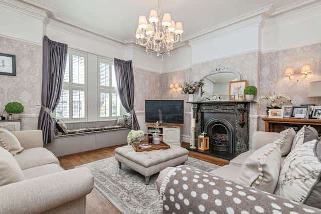 There are sash windows to the front, flooding the rooms with natural light.