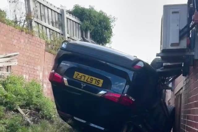 Josh Haigh, 19, was two hours in to his first shift on reception at Improved U Fitness, in Skelmanthorpe, West Yorks., when a black 2017 Mitsubishi Outlander came crashing through the window at around 7.45am