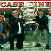 May 1997 and Showcase Cinema manager Fred Booth, second from left  is presented with a trophy for the successful run of  Brassed Off by stars of the film, from left Jim Carter , Phillip Jackson and Pete Postlethwaite.