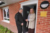 Councillor Jess Lennox with tenant Paul Bennett at his new home on Amberton Terrace.