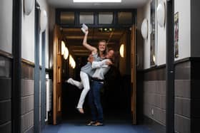 Students Jenny Telford, left, and Alex Swaby celebrate their GCSE results, at Leeds Grammar School in August 2008.