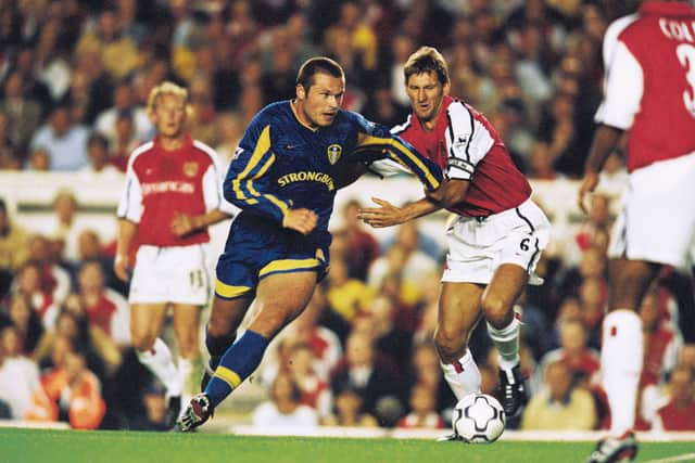 MEMORIES: Of Leeds United and Mark Viduka, above, facing Arsenal in the old blue Strongbow kit.