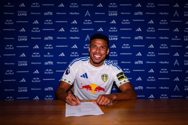 DEAL: James Justin puts pen to paper on a four-year Leeds United deal.