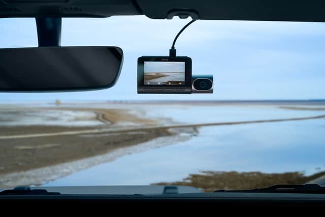 The interior camera is mounted to the main unit - but only records in 1080p, not 4K like the other sensors