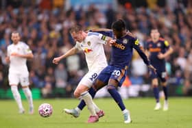 WEIRD ONE: For new Leeds United midfielder Sean Longstaff, facing his former club Newcastle United and pictured holding off Magpies attacker Anthony Elanga.