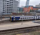A Northern Rail train leaves Leeds City Station.