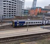 A Northern Rail train leaves Leeds City Station.