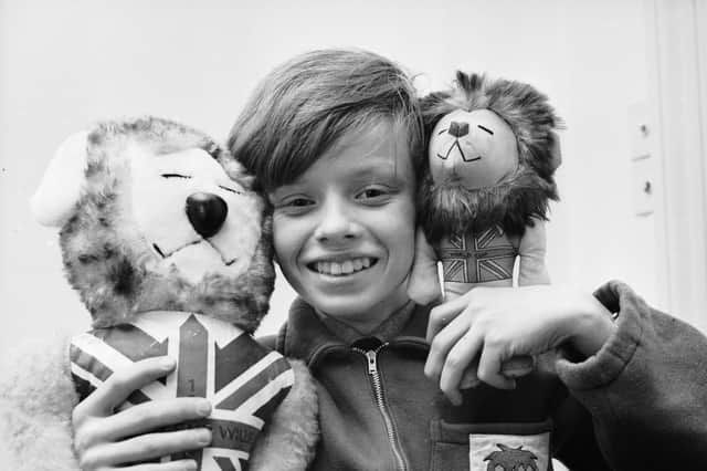 Twelve-year-old Leo Hoye with the 1966 mascot World Cup Willie,designed by his dad Reg Hoye