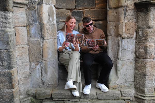 Lauren Dutton of  Bradford and Paul Head of Pudsey find a quiet spot to select their next drinks.