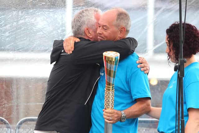 Steve Phillip, who lost his son Jordan, of Leeds, to suicide in 2019, will be one of the Leeds baton bearers on the day. He is pictured hugging fellow Baton of Hope UK co-founder Mike McCarthy, during the 2023 tour.