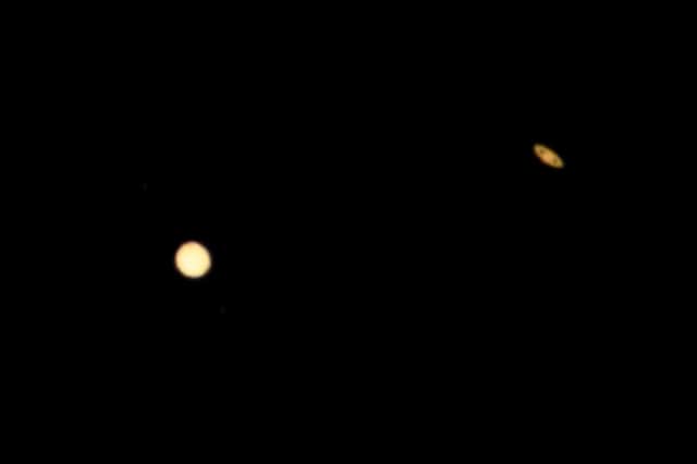 Saturn (right) and Jupiter as seen from Los Angeles, California in 2020 - demonstrating how they look from Earth