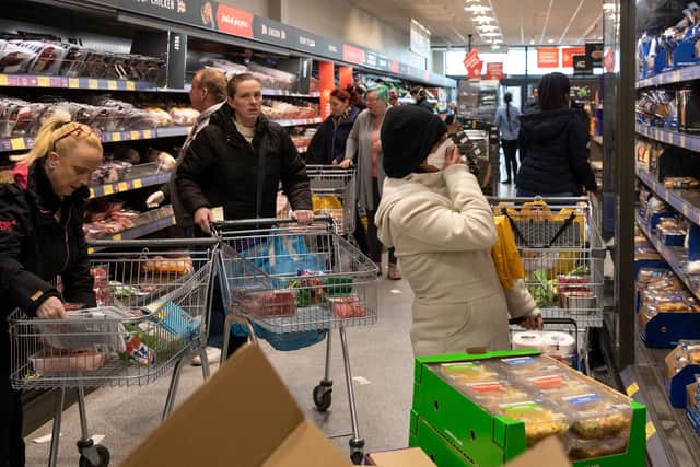 Shoppers in an Aldi supermarket in March 2020. The retailer will open 80 new UK stores over the next two years as part of a £1.6bn plan (Photo: Dan Kitwood/Getty Images)