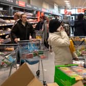 Shoppers in an Aldi supermarket in March 2020. The retailer will open 80 new UK stores over the next two years as part of a £1.6bn plan (Photo: Dan Kitwood/Getty Images)