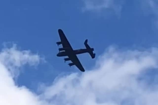Lancaster Bomber flies over Elland, Calderdale.