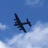 Lancaster Bomber flies over Elland, Calderdale.