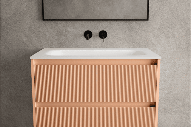 Pantone’s 2024 Colour of the Year, Peach Fuzz, gives the Scanalato vanity a soft and welcoming glow.
