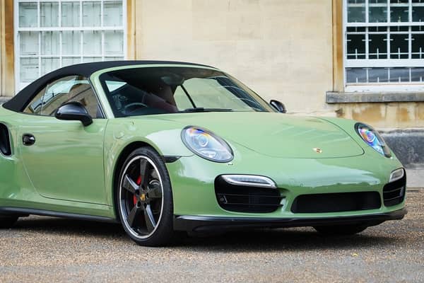 The unusual Battle Green colour really sets this car off