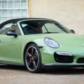 The unusual Battle Green colour really sets this car off