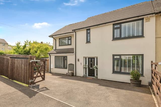 The property has driveway parking for multiple cars
