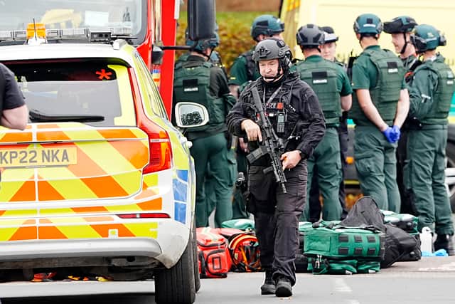 An armed police officer at the scene of an incident at Heaton Park Hebrew Congregation synagogue in Crumpsall, Manchester