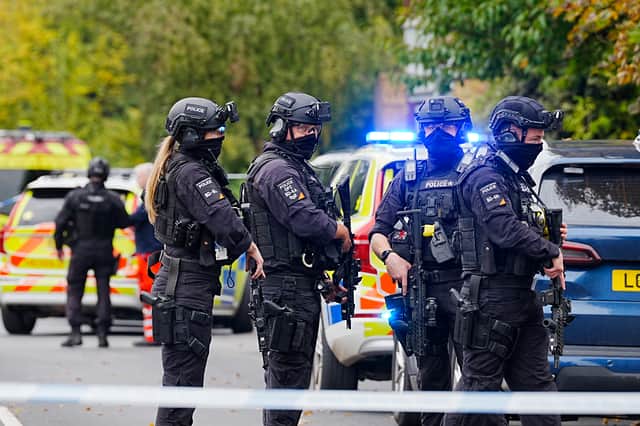 Police confirmed the suspect is dead after shots were fired by armed police at 9.38am